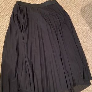Women’s pleated tea length skirt